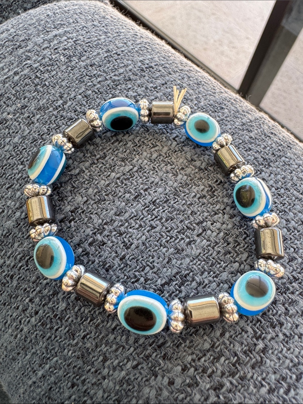 Blue Evil Eye Stretch Bracelet with Silver Accents